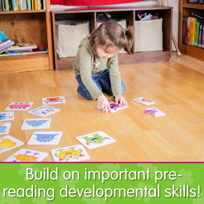 Infographic with little girl playing My First Match It - Monster Match that says, "Build on important pre-reading developmental skills!"