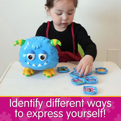 Infographic with little girl playing with Emoji Monster that says, "Identify different ways to express yourself!"