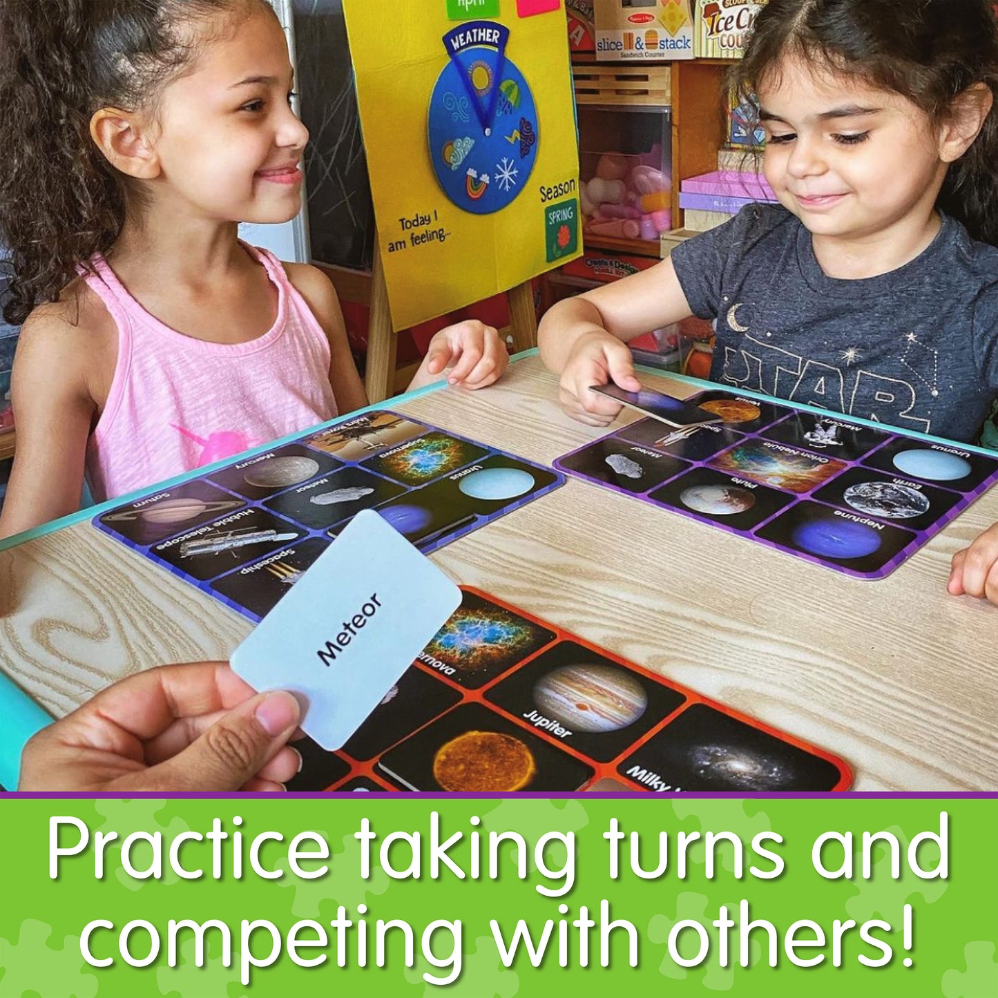 Infographic of two girls playing Match It - Space Bingo that says, "Practice taking turns and competing with others!"